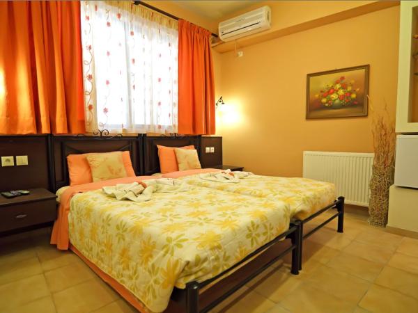 Minos Pension : photo 1 de la chambre chambre lits jumeaux Économique