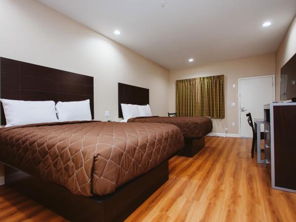 Palace Inn Houston Northwest 290 : photo 3 de la chambre chambre avec 2 grands lits queen-size