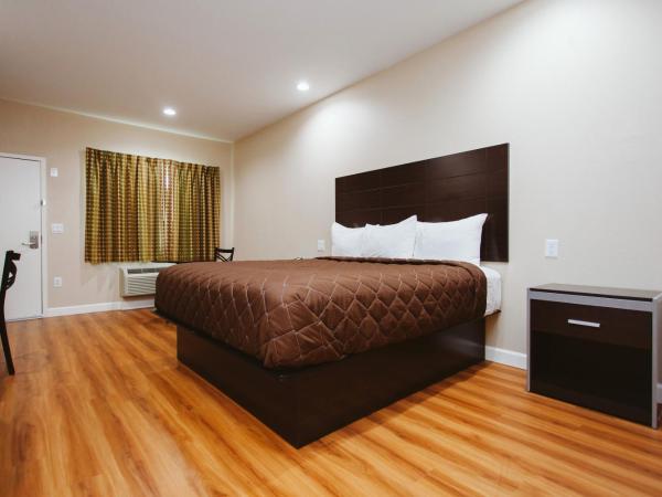 Palace Inn Houston Northwest 290 : photo 8 de la chambre chambre lit king-size - non-fumeurs