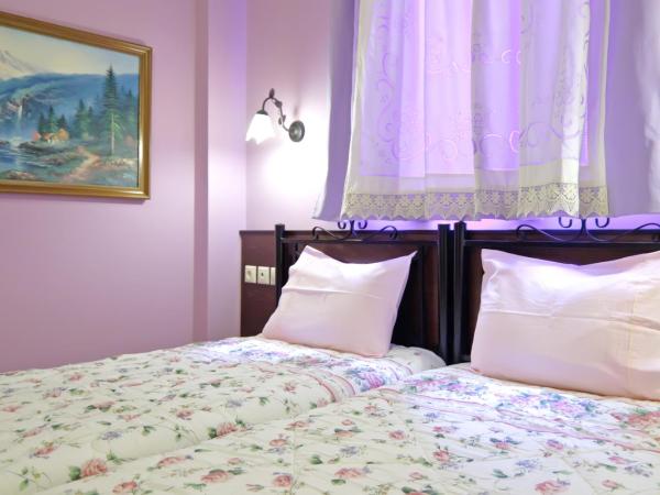 Minos Pension : photo 3 de la chambre chambre lits jumeaux