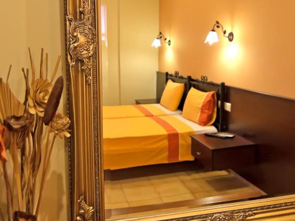 Minos Pension : photo 4 de la chambre studio supérieur - vue sur ville