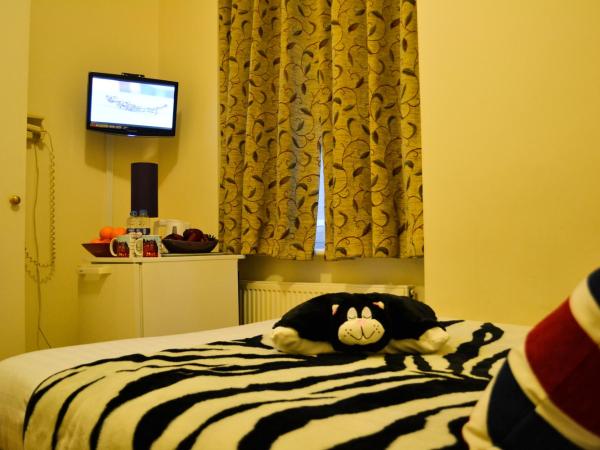 City London Hotel : photo 1 de la chambre chambre double avec salle de bains commune