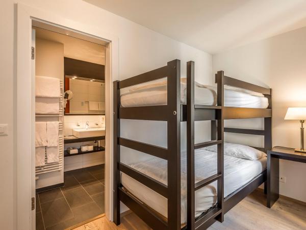 Hotel Alpina Luzern : photo 4 de la chambre chambre quadruple