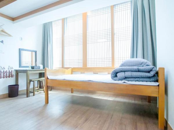 Cocoa Guesthouse : photo 10 de la chambre chambre triple