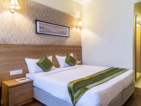 Treebo Premium Grand Emerald : photo 2 de la chambre chambre double standard