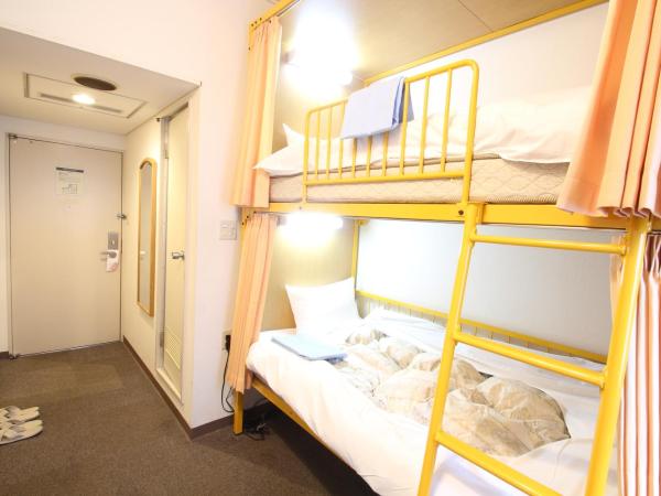 Sakura Hotel Ikebukuro : photo 3 de la chambre chambre lits jumeaux avec salle de bains privative