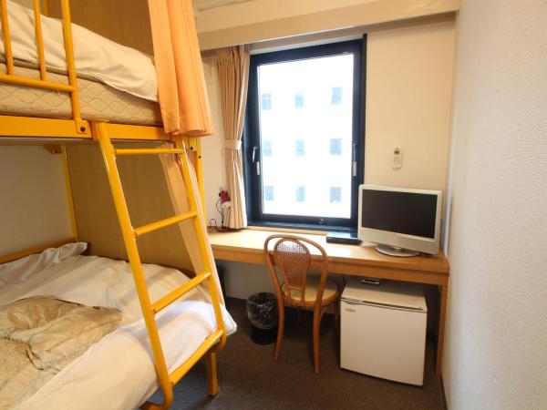 Sakura Hotel Ikebukuro : photo 4 de la chambre chambre lits jumeaux avec salle de bains privative