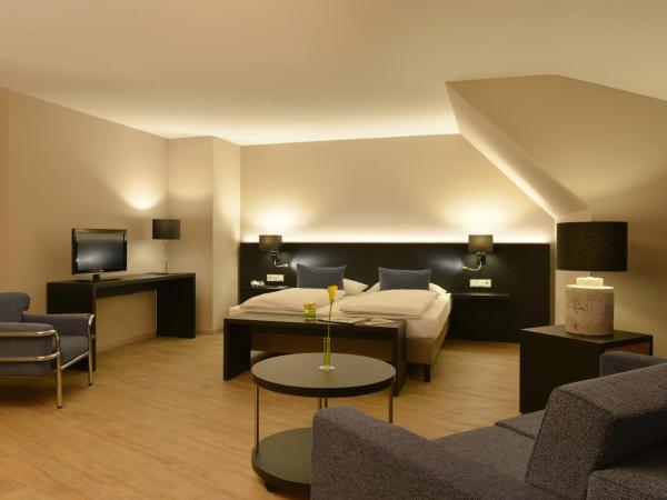 relexa Waldhotel Schatten Stuttgart : photo 4 de la chambre chambre double deluxe