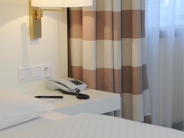 relexa Waldhotel Schatten Stuttgart : photo 1 de la chambre chambre simple Économique