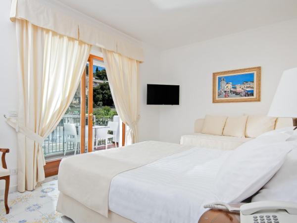 Hotel Syrene : photo 9 de la chambre chambre triple - vue sur jardin