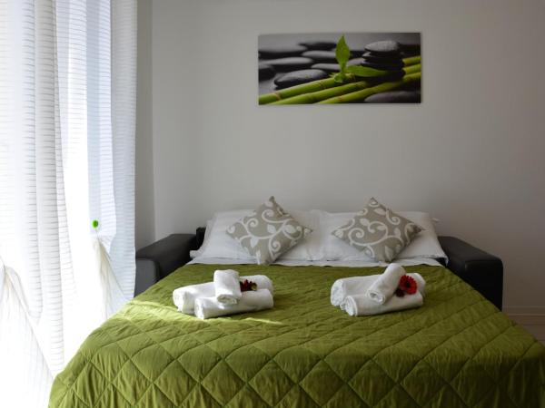 Green Residence : photo 3 de la chambre appartement avec balcon