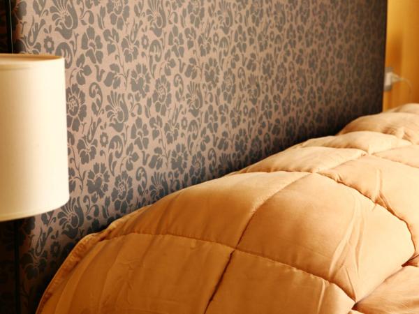 Al Porto Di Cagliari : photo 4 de la chambre chambre double ou lits jumeaux