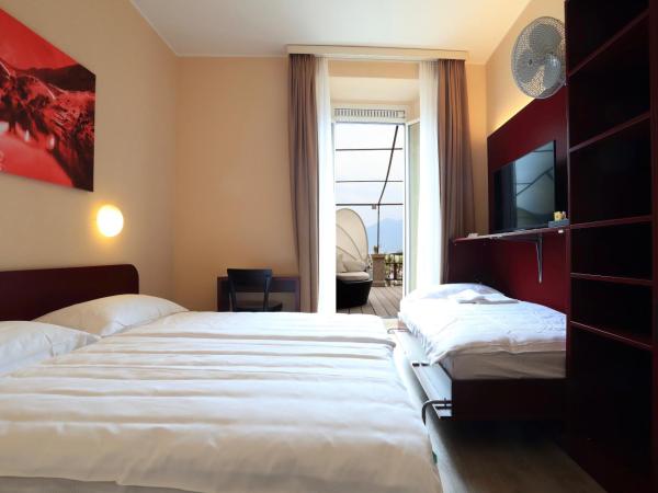 New Elvezia : photo 3 de la chambre chambre lits jumeaux avec terrasse - vue sur lac