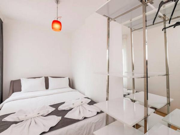 Nish Suites Atasehir : photo 1 de la chambre suite double lit king-size 5+2