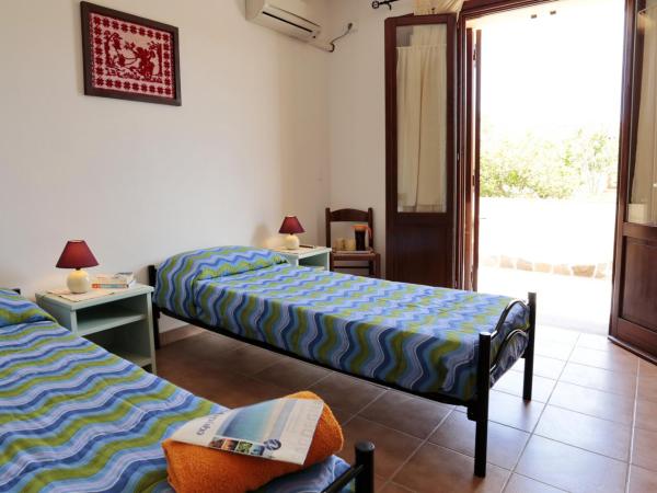 Bed and breakfast Le Camelie : photo 2 de la chambre grande chambre simple 