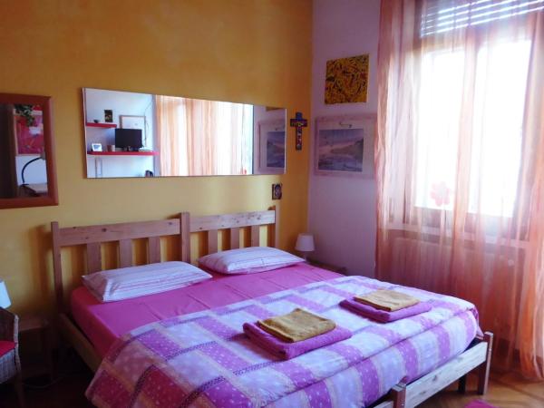 B&B Al Santo : photo 1 de la chambre chambre quadruple - vue sur jardin