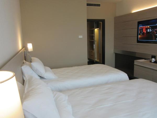 Novotel Brescia Due : photo 3 de la chambre chambre lits jumeaux supérieure