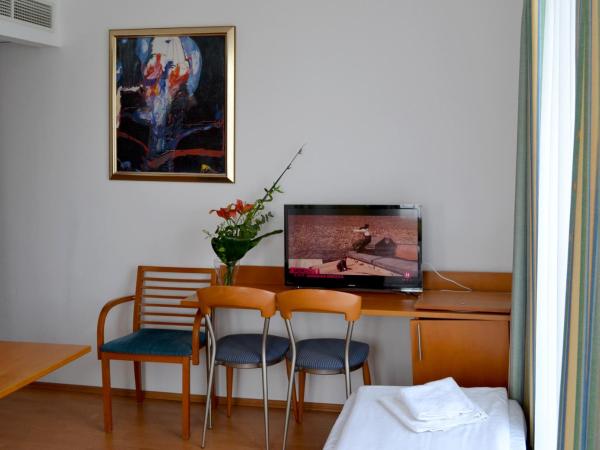 Hotel Veritas : photo 2 de la chambre chambre familiale (2 adultes et 2 enfants)