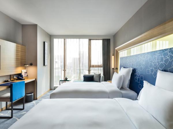 Novotel Ningbo East : photo 1 de la chambre chambre supérieure avec 2 lits simples