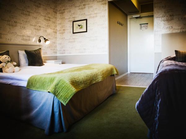 Lilla Rådmannen : photo 7 de la chambre chambre triple