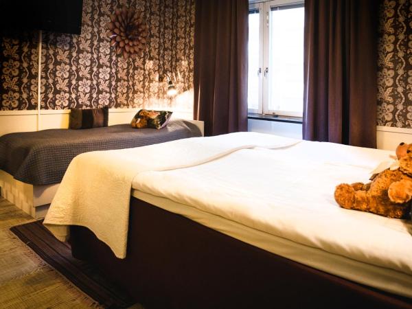 Lilla Rådmannen : photo 8 de la chambre chambre triple