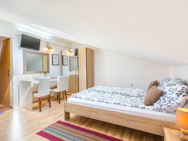 Bed & breakfast La Fontana Medulin : photo 9 de la chambre chambre familiale