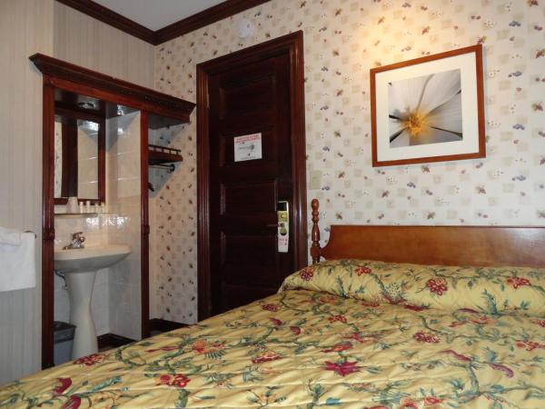 Hotel 31 Extended Stay : photo 4 de la chambre chambre lit queen-size avec salle de bains commune 