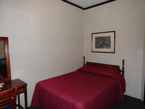 Hotel 31 Extended Stay : photo 4 de la chambre chambre simple avec salle de bains commune