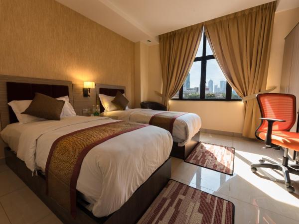 Dolphin Hotel, Chow Kit Kuala Lumpur : photo 2 de la chambre chambre double ou lits jumeaux exécutive