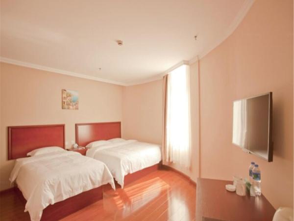 GreenTree Inn Liaoning Dalian Railway Station South Shengli Square Express Hotel : photo 1 de la chambre citoyens de chine continentale - chambre familiale