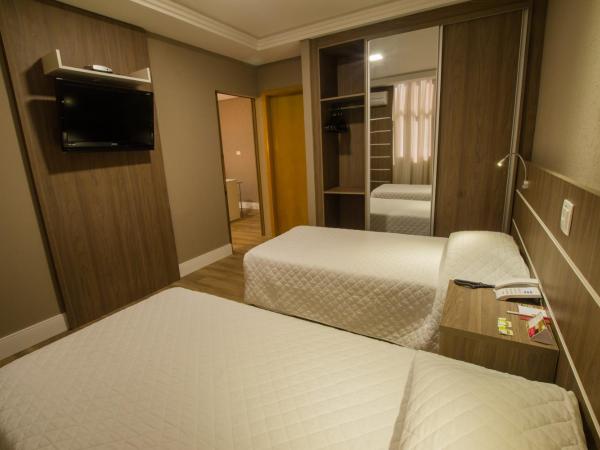 SJ Royal - San Juan Curitiba : photo 4 de la chambre suite supérieure lits jumeaux