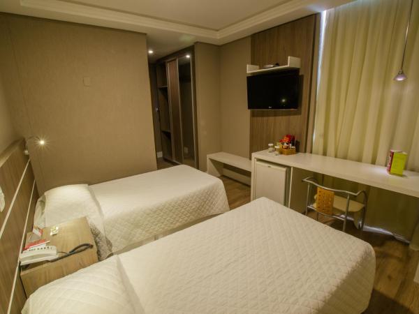 SJ Royal - San Juan Curitiba : photo 1 de la chambre chambre lits jumeaux deluxe