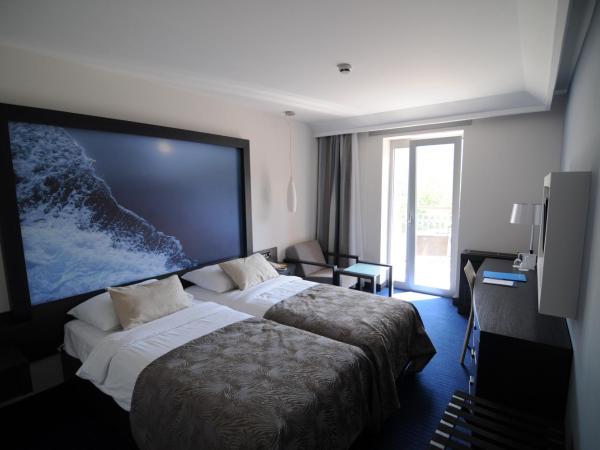 Hotel Lapad : photo 5 de la chambre chambre familiale - 2 chambres communicantes (2 adultes + 2 enfants)