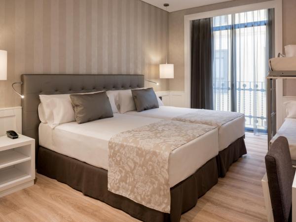 Catalonia Puerta del Sol : photo 4 de la chambre chambre familiale (2 adultes et 2 enfants)