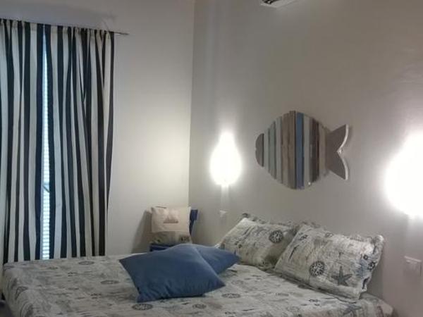 Il Porto dei Sognatori : photo 1 de la chambre chambre triple