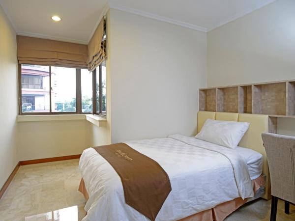 Midtown Residence Simatupang Jakarta : photo 3 de la chambre marvelous family style room