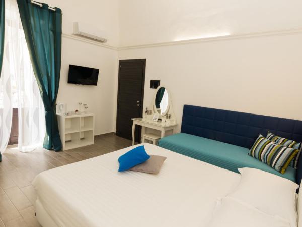 Etna Suite Group : photo 1 de la chambre chambre triple classique