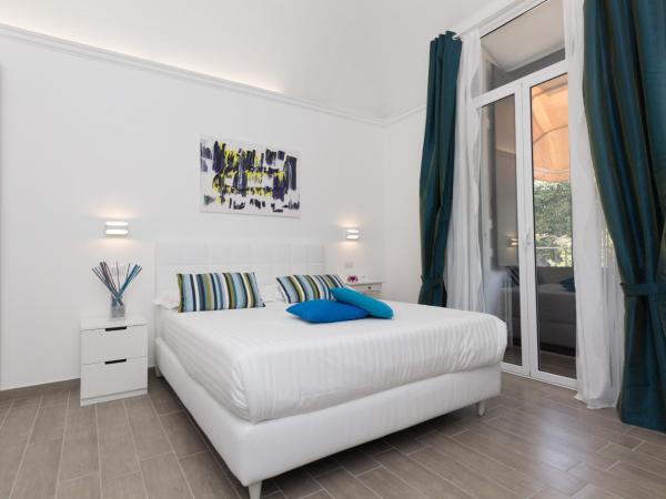 Etna Suite Group : photo 2 de la chambre chambre triple deluxe