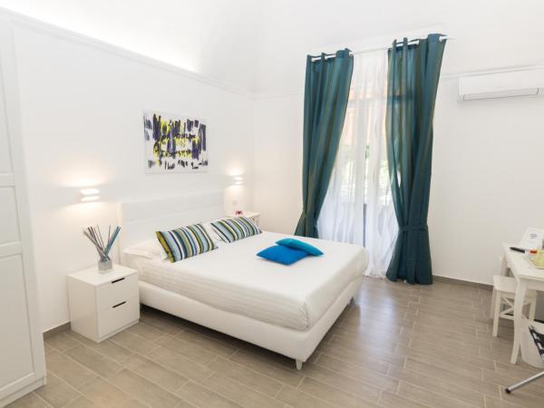 Etna Suite Group : photo 1 de la chambre chambre triple deluxe