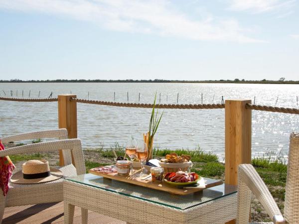 Lodge Sainte Helene Adult only : photo 7 de la chambre roulotte supérieure - vue sur lac