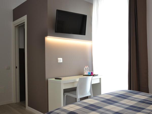 In Centro Glam : photo 4 de la chambre chambre triple