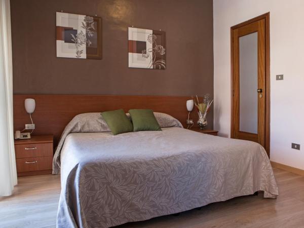 Hotel Adriano : photo 2 de la chambre chambre quadruple
