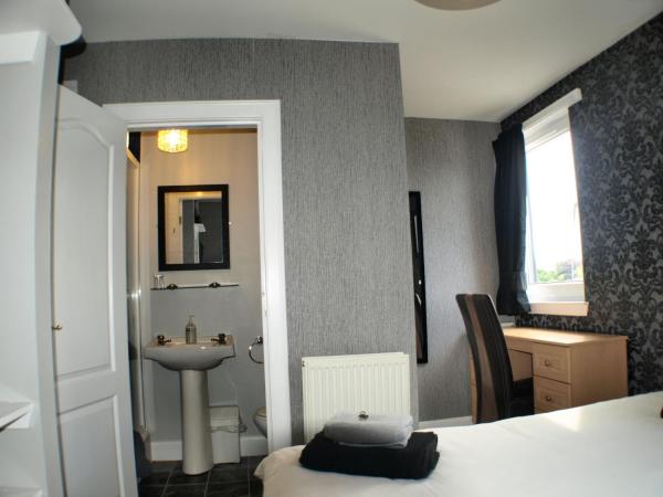 Vaila Guest House : photo 10 de la chambre chambre lits jumeaux avec salle de bains privative