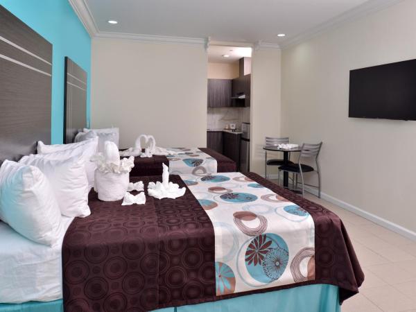 Americas Best Value Inn & Suites - Houston/Hwy 6 & Westpark : photo 3 de la chambre chambre avec 2 grands lits queen-size