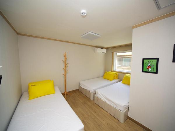 24 Guesthouse KyungHee University : photo 3 de la chambre chambre triple confort