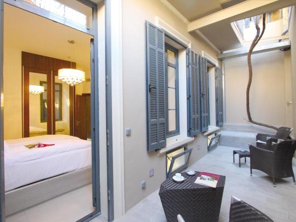 GOLDEN TULIP CANNES HOTEL de PARIS : photo 3 de la chambre appartement 2 chambres (4-6 adultes)