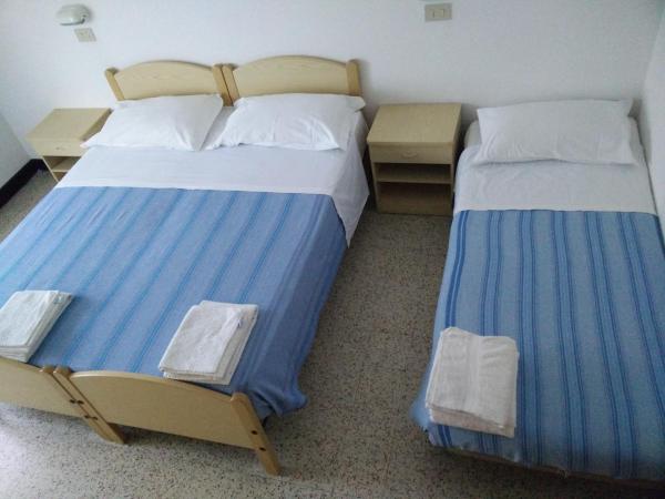 Hotel Ronconi : photo 9 de la chambre chambre triple