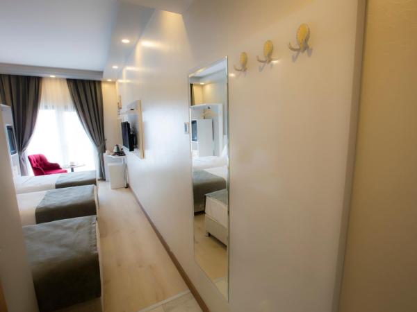 Royal İnci Hotel : photo 6 de la chambre chambre triple deluxe