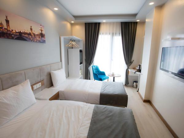 Royal İnci Hotel : photo 4 de la chambre chambre deluxe double ou lits jumeaux