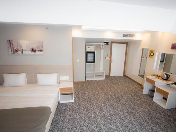 Royal İnci Hotel : photo 2 de la chambre suite familiale de luxe avec balcon